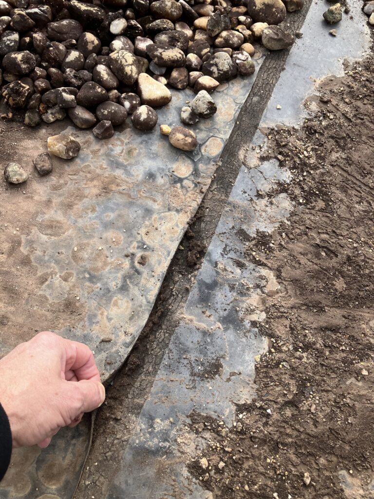 A ballast roof that has delaminated from storm/water damage