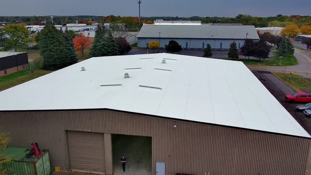 Drone view of newly retrofitted commercial warehouse roof