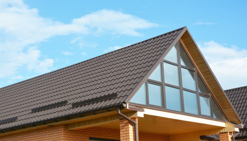 can a metal roof be installed over shingles